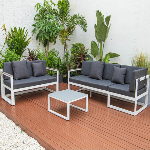 Chelsea White Sectional With Adjustable Headrest & Coffee Table With Cushions