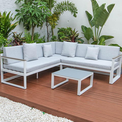 Chelsea Black/White Sectional With Adjustable Headrest & Coffee Table With Cushions