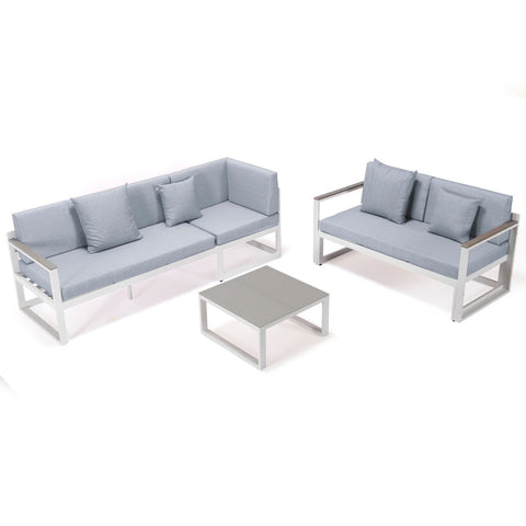 Chelsea White Sectional With Adjustable Headrest & Coffee Table With Cushions