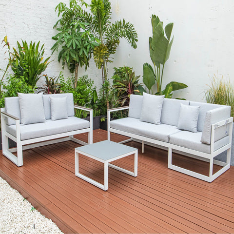 Chelsea White Sectional With Adjustable Headrest & Coffee Table With Cushions