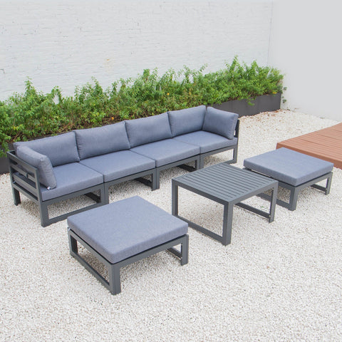 Chelsea 7-Piece Patio Ottoman Sectional And Coffee Table Set Black Aluminum With Cushions