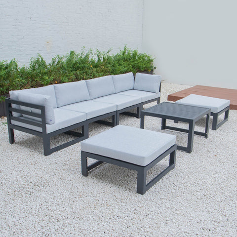 Chelsea 7-Piece Patio Ottoman Sectional And Coffee Table Set Black Aluminum With Cushions